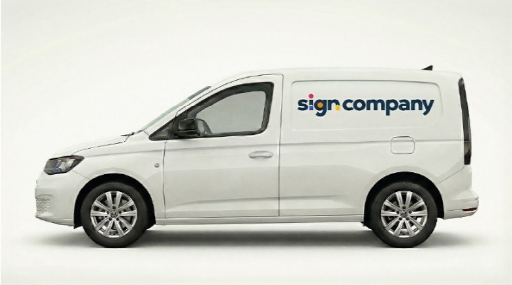 Witte bestelbus met sign.company-belettering